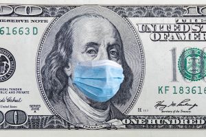 US quarantine, 100 dollar banknote with medical mask. The concept of epidemic and protection against coronavrius.