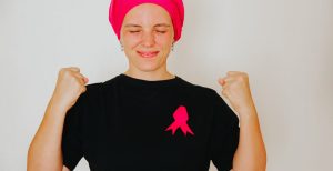 bigstock-Girl-In-A-Pink-Scarf-Black-T-s-322589227-1170x600