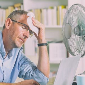 bigstock-man-suffers-from-heat-while-wo-258274495_1_621x621