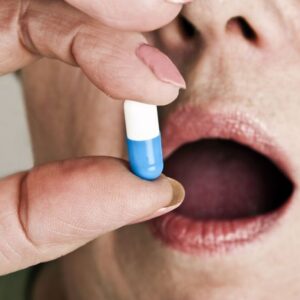 bigstock-mature-woman-take-one-pill-27132146_1_621x621