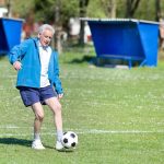 bigstock-old-man-playing-football-89249438_6_928x621