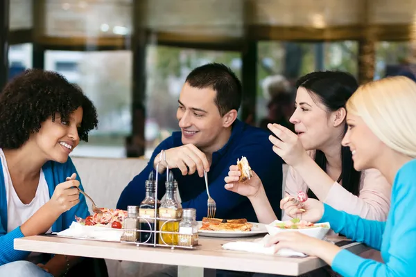 depositphotos_20182959-stock-photo-cheerful-friends-chatting-while-lunch